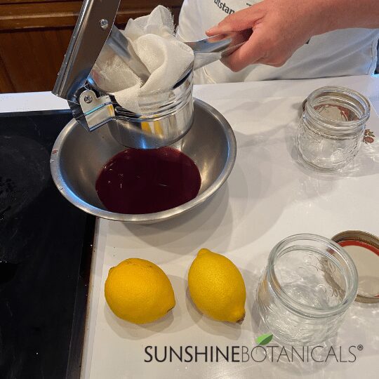 8Elderberries strained in cheesecloth